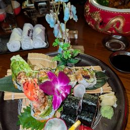 2 types of sushi rolls on one plate. 2 types of sushi rolls on one plate.