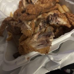 J J's Chicken & Fish - Even the grisel that's normally white  on the corner of the bones is black. Thats means it's exceptionally spoiled.