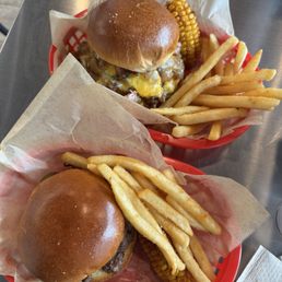 front: single // back: good buns burger -split an order of fries & both burgers came with a corn rib!