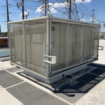 Cold Factor Heating & Air Services - Roof top unit with Special Cage - Heating & Air Conditioning/HVAC Near Me - Lewisville, Texas Cold Factor Heating & Air Services - Roof top unit with Special Cage - Heating & Air Conditioning/HVAC Near Me - Lewisville, Texas