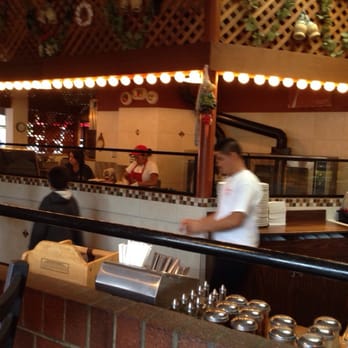 Gianni's Pizza - Watching homemade meatballs being made.  The kids thought it was cool! - Italian Near Me - Monterey, California