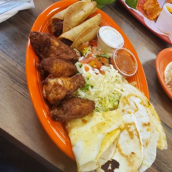 El Maguey - Appetizer Sampler: Chicken Wings, 2 Cheese Quesadilla slices, 2 Chicken Quesadilla slices, 2 Chicken Taquitos - Mexican Near Me - Florissant, Missouri El Maguey - Appetizer Sampler: Chicken Wings, 2 Cheese Quesadilla slices, 2 Chicken Quesadilla slices, 2 Chicken Taquitos - Mexican Near Me - Florissant, Missouri