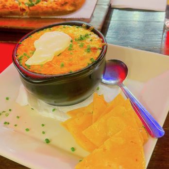 Dinerbar - Bowl of chilli with housemade tortilla chips - Diners Near Me - Rego Park, New York Dinerbar - Bowl of chilli with housemade tortilla chips - Diners Near Me - Rego Park, New York