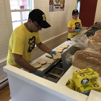 MOO MOO Grilled Cheese - a man making sandwiches - Sandwiches Near Me - Cavendish, Prince Edward Island