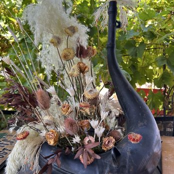 Conroy's Flowers - Dried flowers in motorcycle exhaust pipe - Floral Designers Near Me - Newport Beach, California Conroy's Flowers - Dried flowers in motorcycle exhaust pipe - Floral Designers Near Me - Newport Beach, California