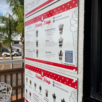 Shake Shop - a menu on the outside of a building - Ice Cream & Frozen Yogurt Near Me - Treasure Island, Florida