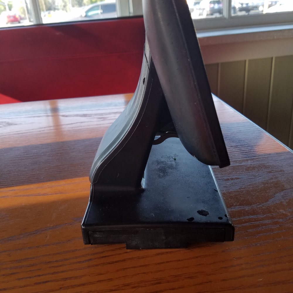 Chili's - Food dried on the base of the box you use to pay for your meal. - American Near Me - Midvale, Utah