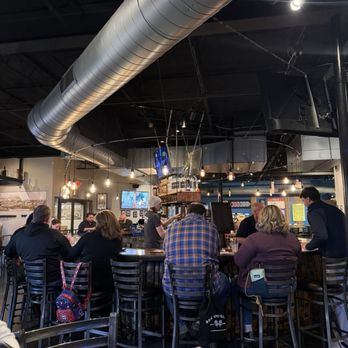 Great Lakes Distillery - The inside of the taproom with the circular bar in the middle - Distilleries Near Me - Milwaukee, Wisconsin