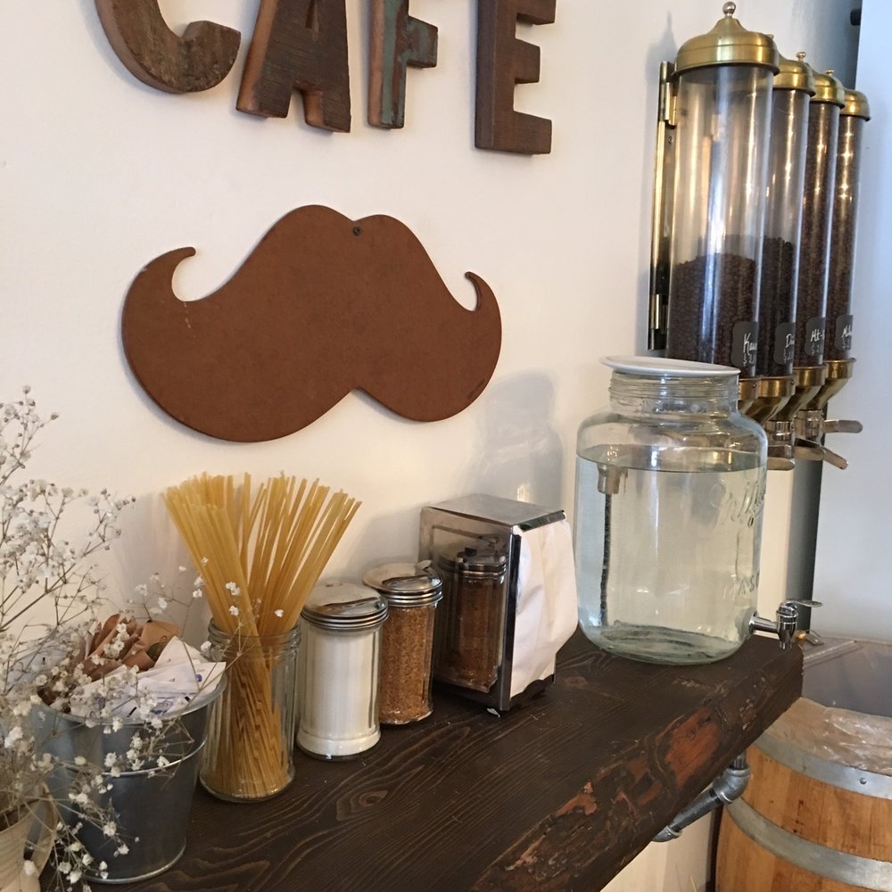 Moustache Café - a moustache sign on the wall - Cafes Near Me - Montreal, Quebec Moustache Café - a moustache sign on the wall - Cafes Near Me - Montreal, Quebec