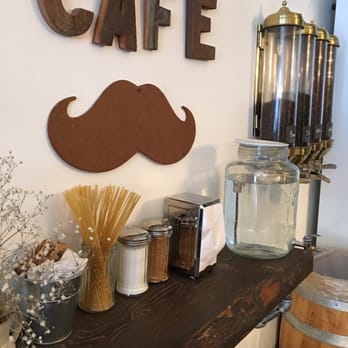 Moustache Café - a moustache sign on the wall - Cafes Near Me - Montreal, Quebec Moustache Café - a moustache sign on the wall - Cafes Near Me - Montreal, Quebec