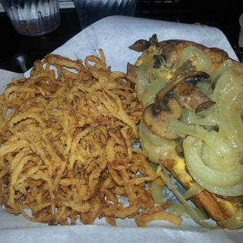 Helen's Kitchen & Catering - Tri tip sandwich with onion straws as a side. - Caterers Near Me - Maricopa, Arizona