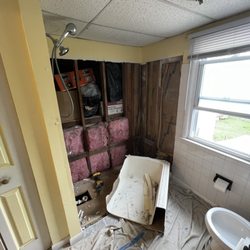 S&S Painting & Home Improvements - Demo of old tub ( walls already out )