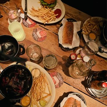 The Old Monk - a table full of food - Pubs Near Me - Dallas, Texas The Old Monk - a table full of food - Pubs Near Me - Dallas, Texas