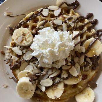 The Leaning Maple - Banana Nut Waffle - Banana, Nutella, sliced almonds, honey, whipped cream - Coffee & Tea Near Me - Olympia, Washington