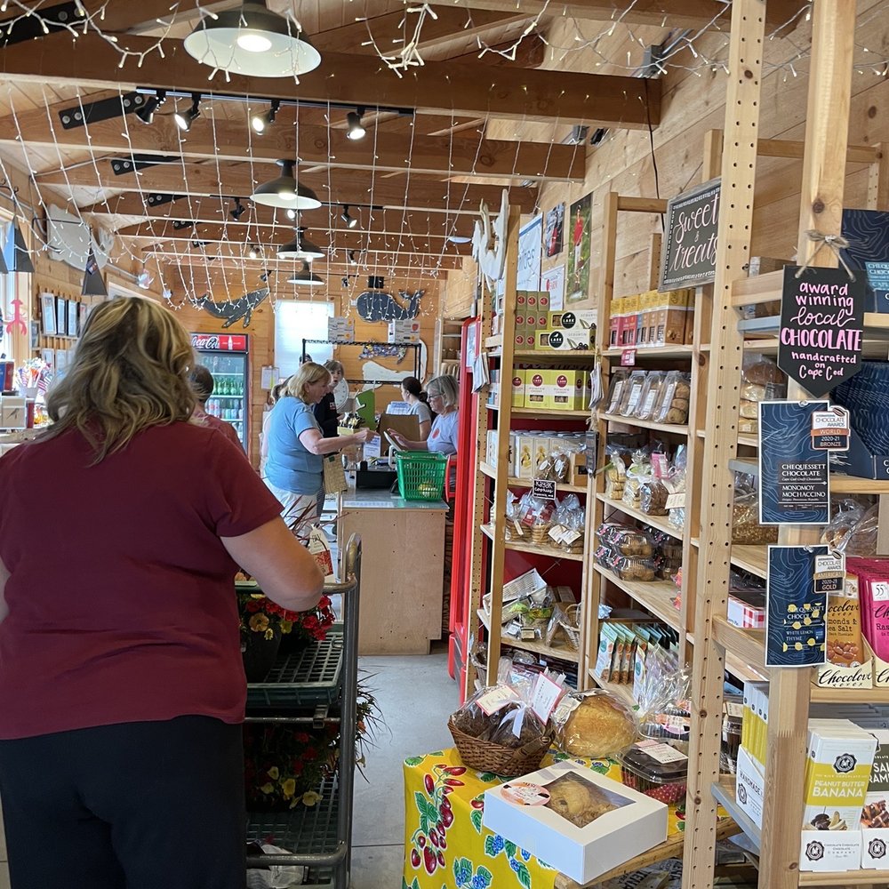 Cape Abilities Farm - a woman shopping in a store - Farmers Market Near Me - Dennis, Massachusetts Cape Abilities Farm - a woman shopping in a store - Farmers Market Near Me - Dennis, Massachusetts