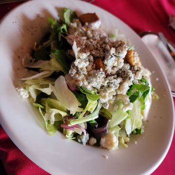 Bentley's Restaurant - Dinner salad the blue cheese crumbles and dressing - Seafood Near Me - Lake Ozark, Missouri