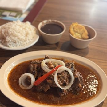 Andrea’s Restaurant and Lounge - Oxtails, white rice, gravy and fried plantains - Caribbean Near Me - Auburndale, Florida Andrea’s Restaurant and Lounge - Oxtails, white rice, gravy and fried plantains - Caribbean Near Me - Auburndale, Florida
