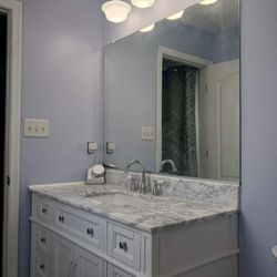 Tad-Bit Construction & Home Repairs - New vanity and light fixture