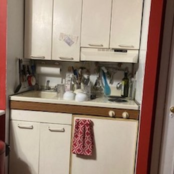 Elmont Capital - Before: Prehistoric metal kitchenette with chipped enamel surfaces - General Contractors Near Me Elmont Capital - Before: Prehistoric metal kitchenette with chipped enamel surfaces - General Contractors Near Me