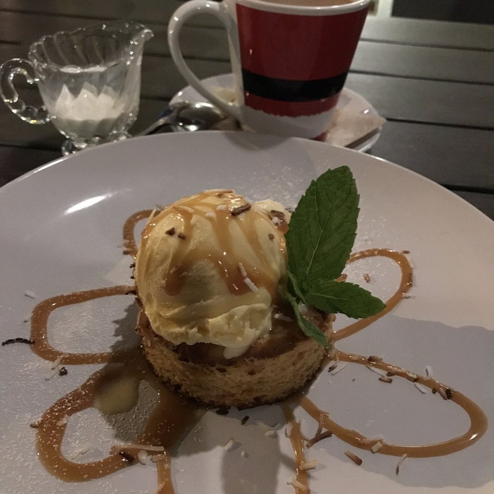 Calypso Edmonds - Rum cake with ice cream and rum caramel saauce - Caribbean Near Me - Edmonds, Washington