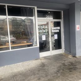 Exterior outside entrance of Rise & Grind Coffee - Entrance to multiple businesses. - Oakland, California Exterior outside entrance of Rise & Grind Coffee - Entrance to multiple businesses. - Oakland, California