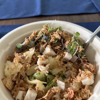 Emoji Poke - Chicken bowl with pineapple, ginger, cucumbers, scallions and crispy onions. Dressed with lime dressing - Sushi Bars Near Me - Mount Pleasant, South Carolina
