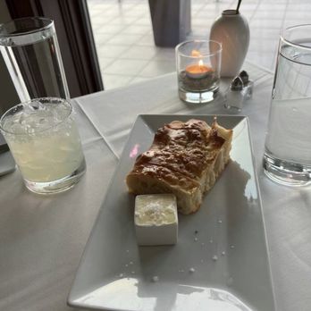 Restaurant Beck - Bread with salt on top of butter. The salt was a little overwhelming. - New American Near Me - Depoe Bay, Oregon Restaurant Beck - Bread with salt on top of butter. The salt was a little overwhelming. - New American Near Me - Depoe Bay, Oregon