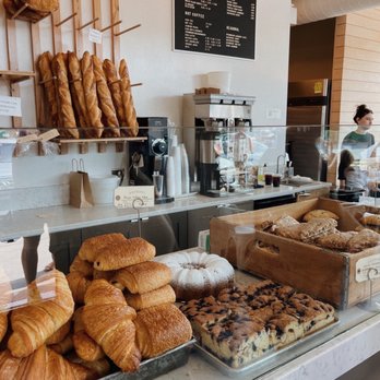 Yellow Dog Bread Company - a bakery counter full of baked goods - Coffee & Tea Near Me - Raleigh, North Carolina