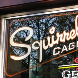 the reflection of the sign in the window