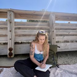 Sitting by one of the beaches