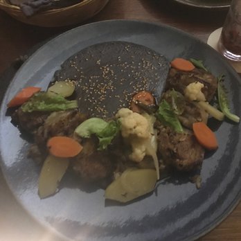 Los Danzantes - Chamorro de cerdo con mole rojo - Mexican Near Me - Oaxaca, OAX Los Danzantes - Chamorro de cerdo con mole rojo - Mexican Near Me - Oaxaca, OAX