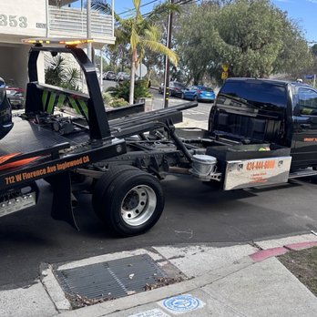 Urgent Towing - My Tesla Y with a flat tire being towed to the Tesla service center. - Towing Near Me - Inglewood, California Urgent Towing - My Tesla Y with a flat tire being towed to the Tesla service center. - Towing Near Me - Inglewood, California