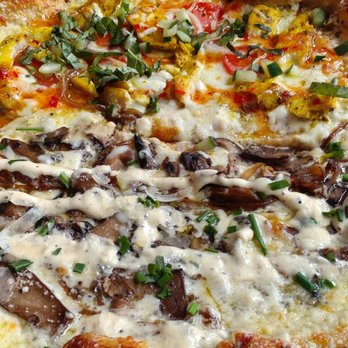 Mellow Mushroom Blacksburg - Half and half of the chicken curry (Thai Dye) and the mushroom (Holy Shiitake). - Pizza Near Me - Blacksburg, Virginia