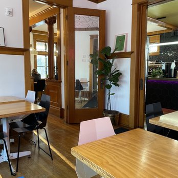 Coffeesmith - a table and chairs in a coffee shop - Coffee & Tea Near Me - Forest Lake, Minnesota Coffeesmith - a table and chairs in a coffee shop - Coffee & Tea Near Me - Forest Lake, Minnesota