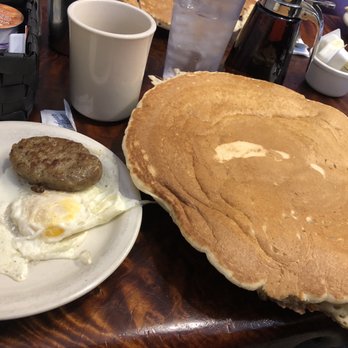 Potato Shack Cafe - Two eggs over medium, sausage patty and manhole pancake (plain). - American Near Me - Encinitas, California Potato Shack Cafe - Two eggs over medium, sausage patty and manhole pancake (plain). - American Near Me - Encinitas, California