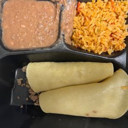 Rosa's Café & Tortilla Factory - No enchilada sauce, cheese or lettuce. Beans spilling over into the rice.
