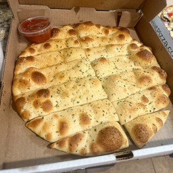 Straw Hat Pizza - Medium breadsticks with marinara sauce. - Pizza Near Me - Visalia, California Straw Hat Pizza - Medium breadsticks with marinara sauce. - Pizza Near Me - Visalia, California