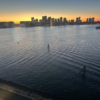 Hyatt Regency Boston Harbor - Sunsets define the Boston skyline. Ships by day - Hotels Near Me - Boston, Massachusetts