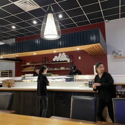 Kumo Sushi - Lille on the left with staff