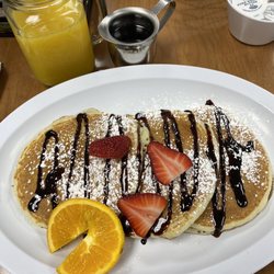 Chocolate chip pancakes and orange juice