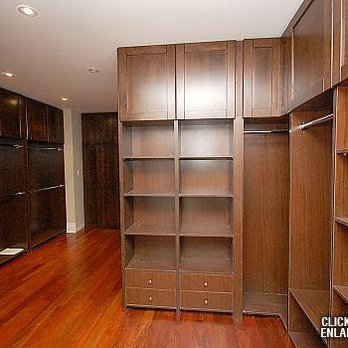 IBD - International Brown Developments - a walk - in closet - General Contractors Near Me - Tottenham, Ontario IBD - International Brown Developments - a walk - in closet - General Contractors Near Me - Tottenham, Ontario