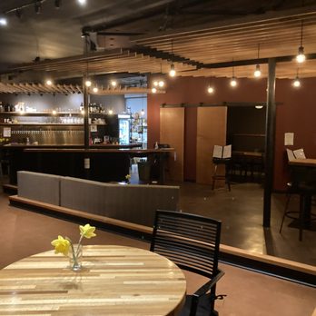 Drumlin - a table with a vase of flowers on it - Cafes Near Me - Shoreline, Washington Drumlin - a table with a vase of flowers on it - Cafes Near Me - Shoreline, Washington