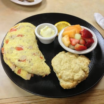 Blue Dolphin Cafe - California omelette with a biscuit and fruit. - Burgers Near Me - Longboat Key, Florida