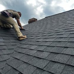 Integral Home Inspections - Inspecting a ridge vent.