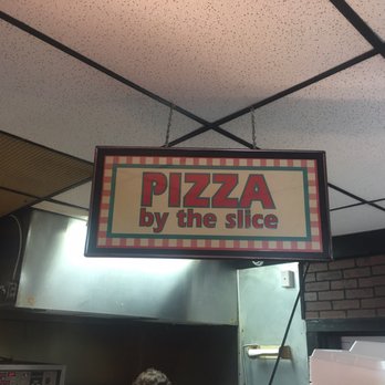 Showcase Meats - They do sell pizza by the slice but MAN that's tuff to only eat one. - Meat Shops Near Me - Akron, Ohio Showcase Meats - They do sell pizza by the slice but MAN that's tuff to only eat one. - Meat Shops Near Me - Akron, Ohio