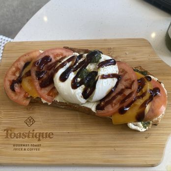 Toastique - Tomato Burrata Toast - Coffee & Tea Near Me - Woodbury, New York Toastique - Tomato Burrata Toast - Coffee & Tea Near Me - Woodbury, New York