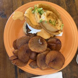 Cj's Corner Grill - Smoked brisket, eggs, onion rings, hollandaise sauce and home made potato fries