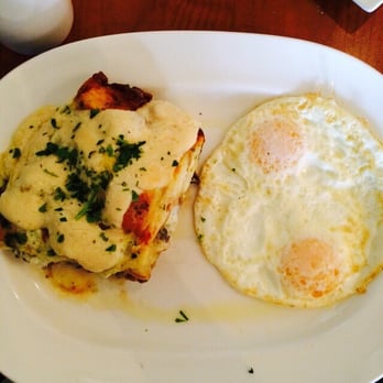 Blue's Egg + Bakery - An aerial view of the mushroom strata with a side of over medium eggs. MY FAVE!! - Breakfast & Brunch Near Me - Milwaukee, Wisconsin