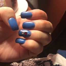 Blue dip ombré with crystal accents. Blue dip ombré with crystal accents.