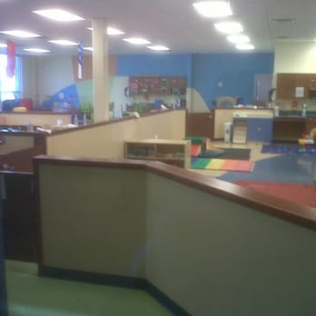 Hockessin Athletic Club - glimpse into the childcare room through a door window. - Sports Clubs Near Me - Hockessin, Delaware